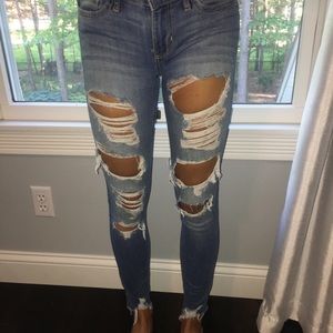 hollister medium wash ripped jeans